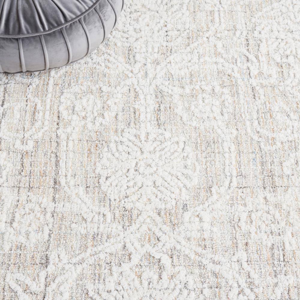 Ivory Tufted Wool 4' x 6' Rectangular Area Rug