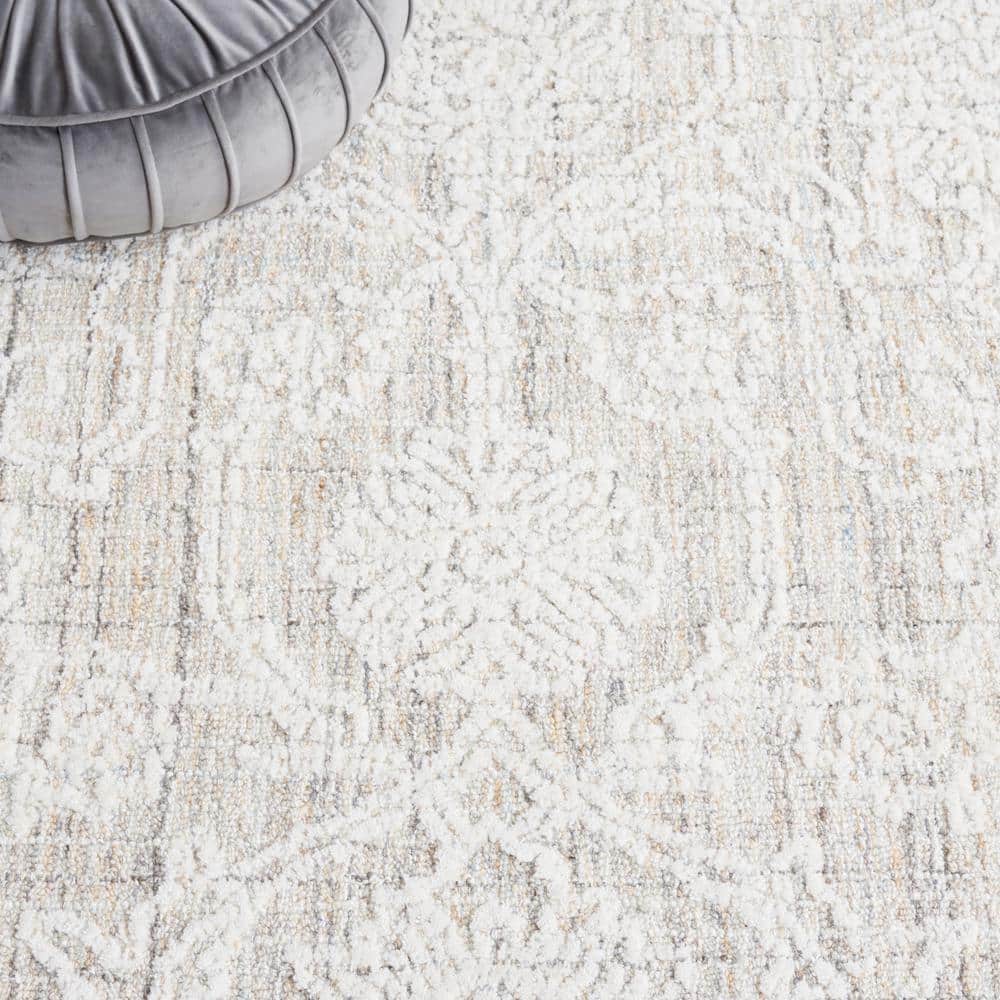 Ivory Wool 8' x 10' Handmade Tufted Area Rug