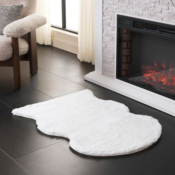 Faux Sheep Skin 2 ft. x 3 ft. Ivory Flokati Solid Color Area Rug