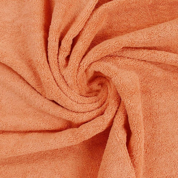 https://images.thdstatic.com/productImages/3fecee92-5c68-4029-a9df-4f6f1a16132f/svn/peach-bath-towels-snph002in343-fa_600.jpg