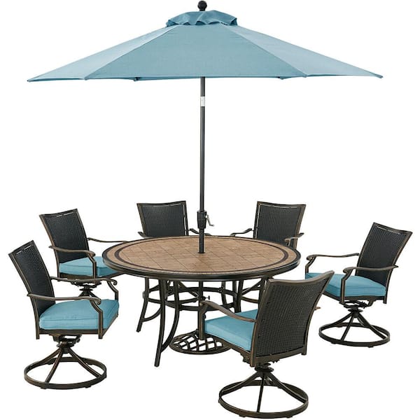 Hanover Monaco 7-Piece Aluminum Outdoor Dining Set with Blue Cushions, 6 Wicker Swivel Rockers, Tile-Top Table and Umbrella