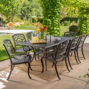 Abigal Shiny Copper Finish 9-Piece Cast Aluminum Rectangular Outdoor Dining Set