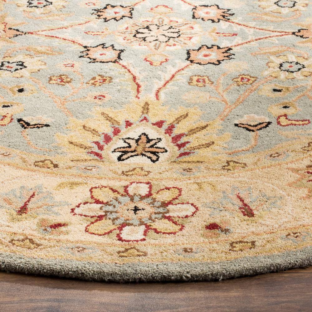 Elegant Ivory Wool 6' Round Hand-Tufted Area Rug