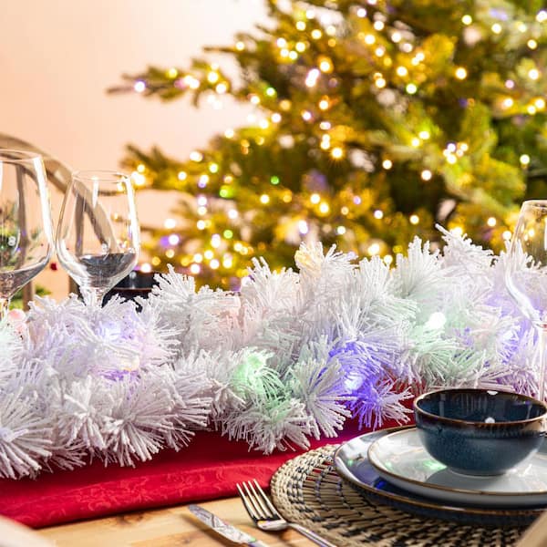 Glitzhome 9 ft. Pre-Lit Snow Flocked White Pine Christmas Garland