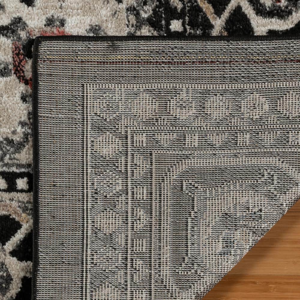 Heirloom Black and Beige Tufted 8' x 10' Synthetic Area Rug