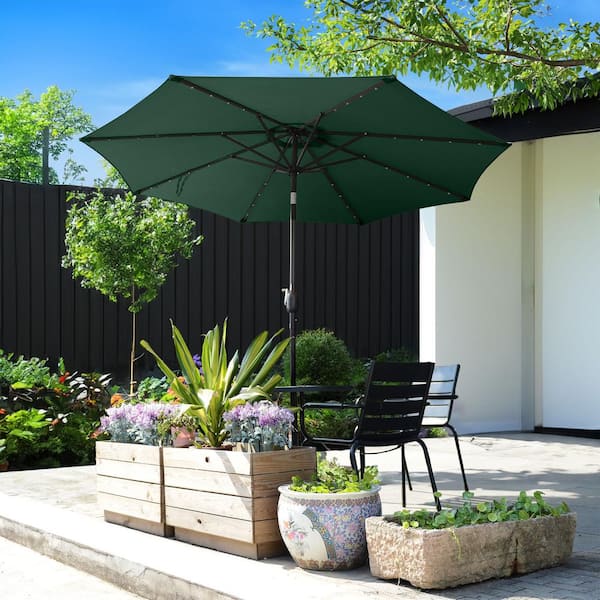 9 ft. Steel Solar LED Lighted Patio Market Umbrella with Auto Tilt, Easy Crank Lift in Green