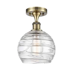 Athens Deco Swirl 8 in. 1-Light Antique Brass Semi-Flush Mount with Clear Deco Swirl Glass Shade
