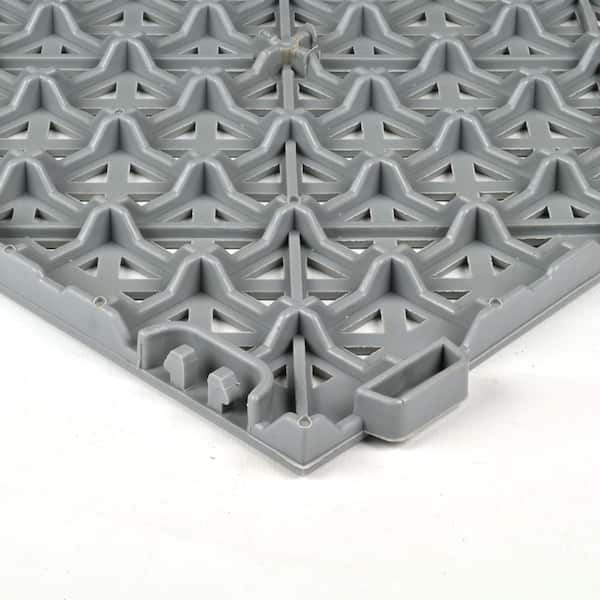https://images.thdstatic.com/productImages/40365463-86df-4066-857d-3779f364de08/svn/tan-perforated-top-greatmats-gym-floor-tiles-stlp12x12tan26-66_600.jpg