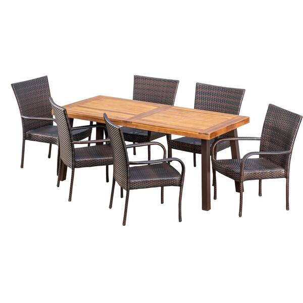 Faulds 7 piece outdoor dining set 2024 with wood table and wicker chairs