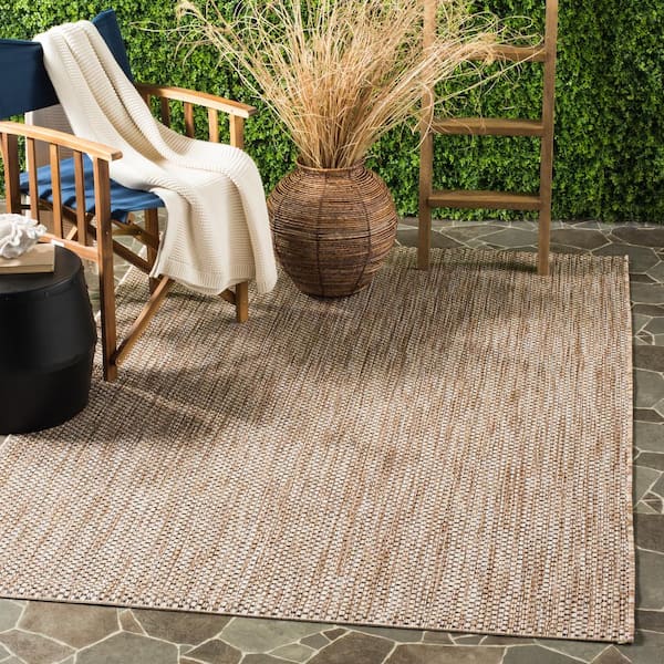 Courtyard Natural/Black 7 ft. x 10 ft. Solid Indoor/Outdoor Patio  Area Rug
