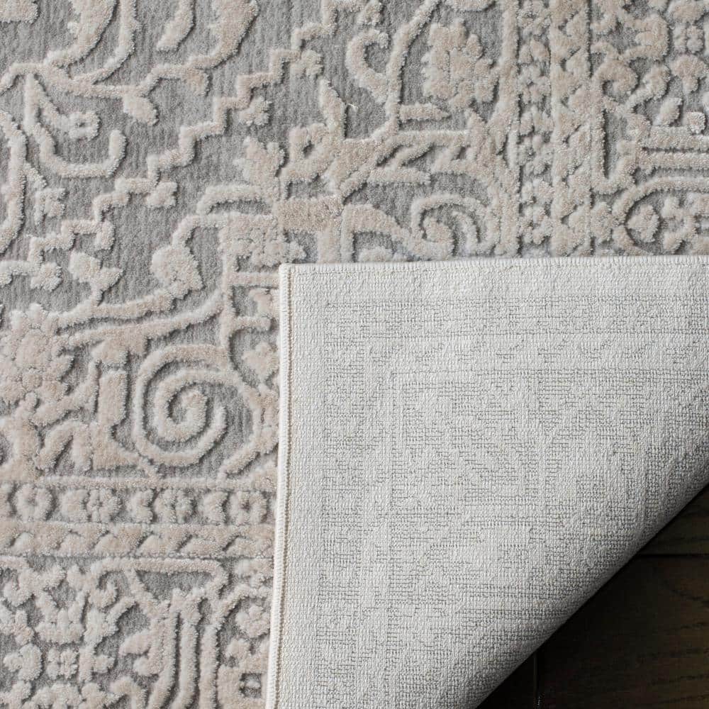 Light Grey and Cream Floral Synthetic 8' x 10' Area Rug