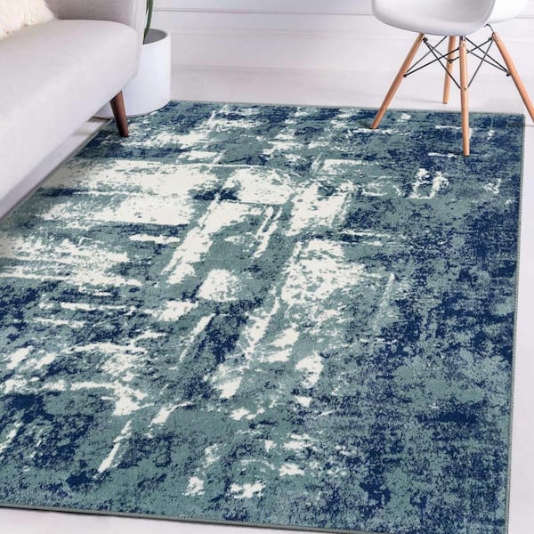 https://images.thdstatic.com/productImages/40712eae-257e-4a61-9cb0-0cfaeec0dc55/svn/blue-luxe-weavers-area-rugs-49-blue-9x12-1f_600.jpg