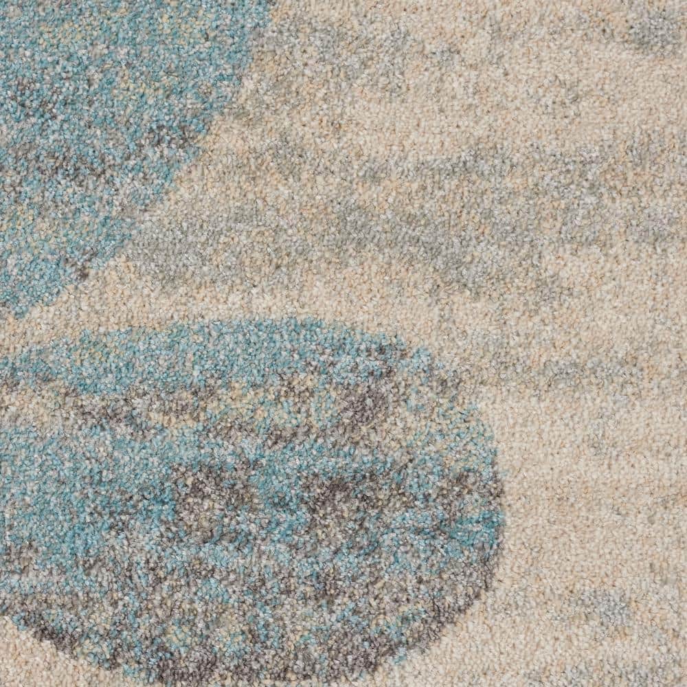 Ivory and Light Blue Floral Synthetic 8' x 10' Area Rug