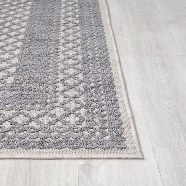 Wyatt Blue 5 ft. x 7 ft. Geometric Bordered High-Low Yarn Indoor/Outdoor Area Rug