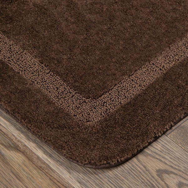 https://images.thdstatic.com/productImages/40ae5f86-5c4c-4f5b-b24b-364f74c0b369/svn/chocolate-mohawk-home-bathroom-rugs-bath-mats-278884-1f_600.jpg