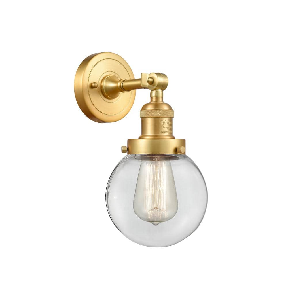 Beacon 1-Light Satin Gold, Clear Wall Sconce with Clear Glass Shade price history on PriceWatchPro