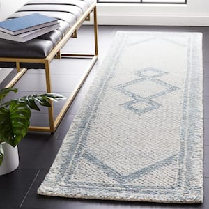Abstract Ivory/Blue 2 ft. x 4 ft. Geometric Border Area Rug