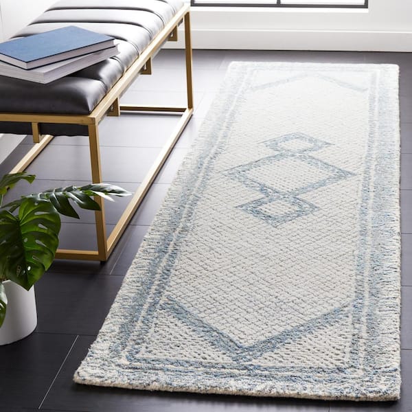 Abstract Ivory/Blue Doormat 2 ft. x 4 ft. Geometric Border Area Rug