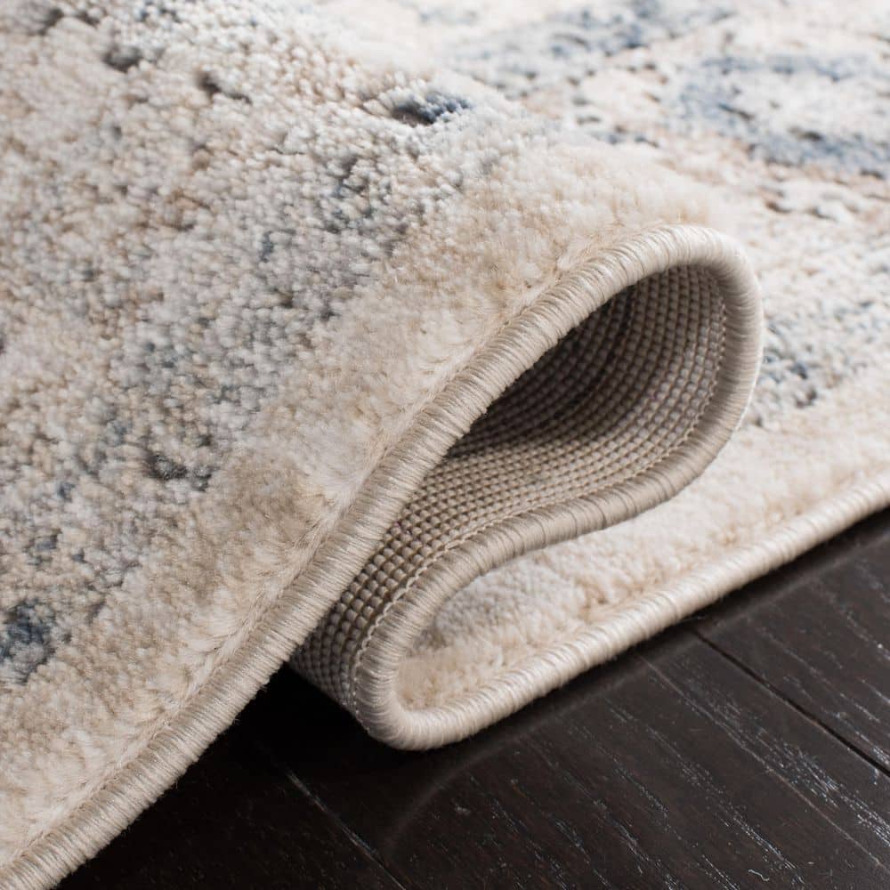 Ivory Blue Hand-Knotted Synthetic 6'7" x 9' Area Rug