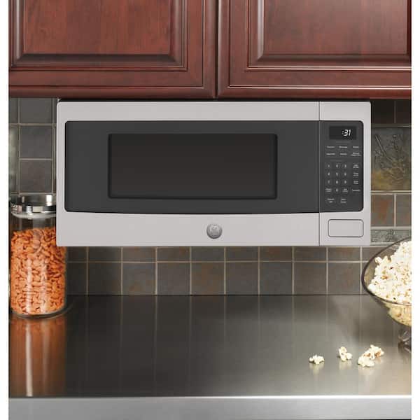 https://images.thdstatic.com/productImages/40cbea3f-4c6a-4ce3-8cd3-1d045aaaf90b/svn/stainless-steel-ge-profile-countertop-microwaves-pem31sfss-66_600.jpg