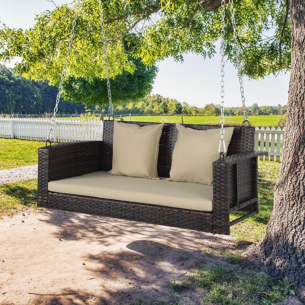 Brown Wicker Steel Porch Swing with Beige Cushions
