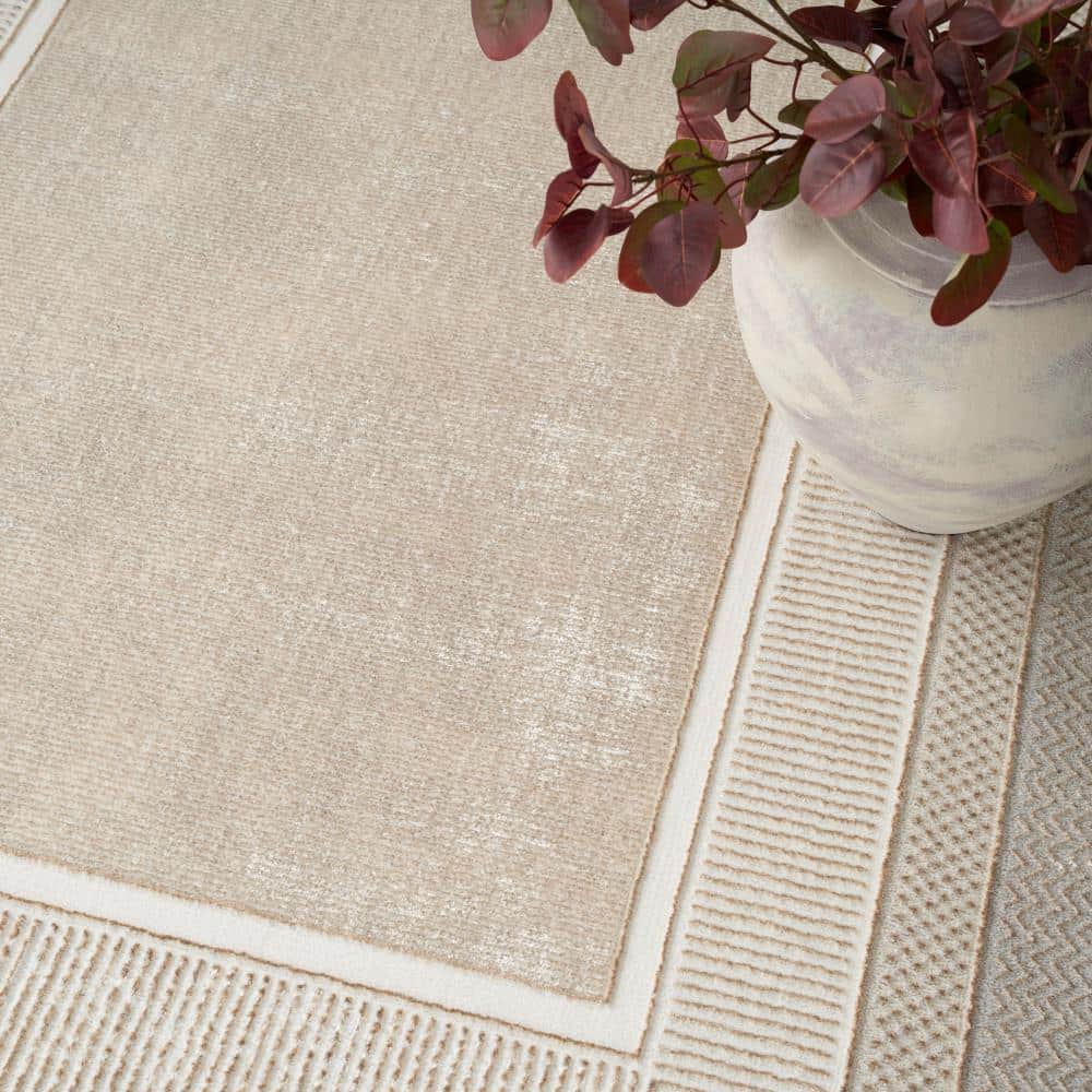 Ivory Geometric Abstract 5' x 7' Easy-Care Synthetic Area Rug