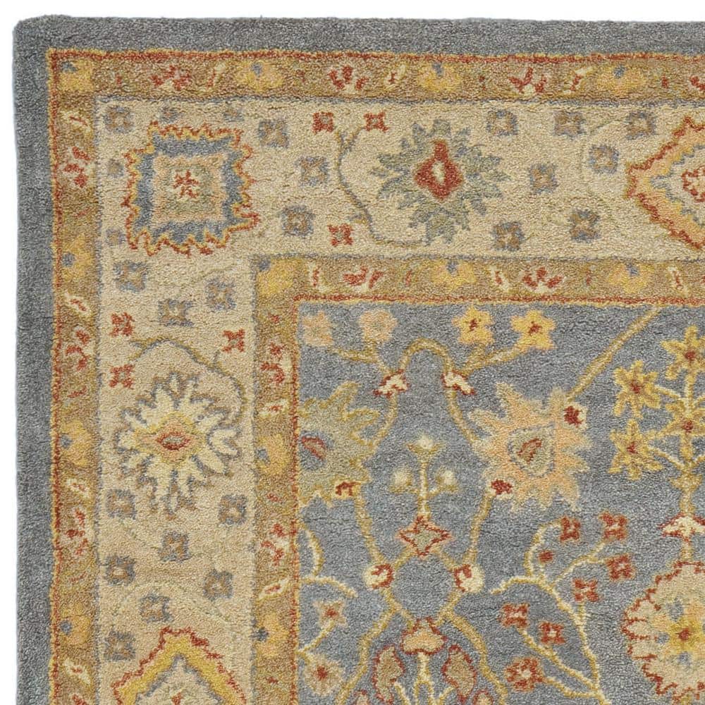 Handmade Blue and Ivory Tufted Wool Area Rug