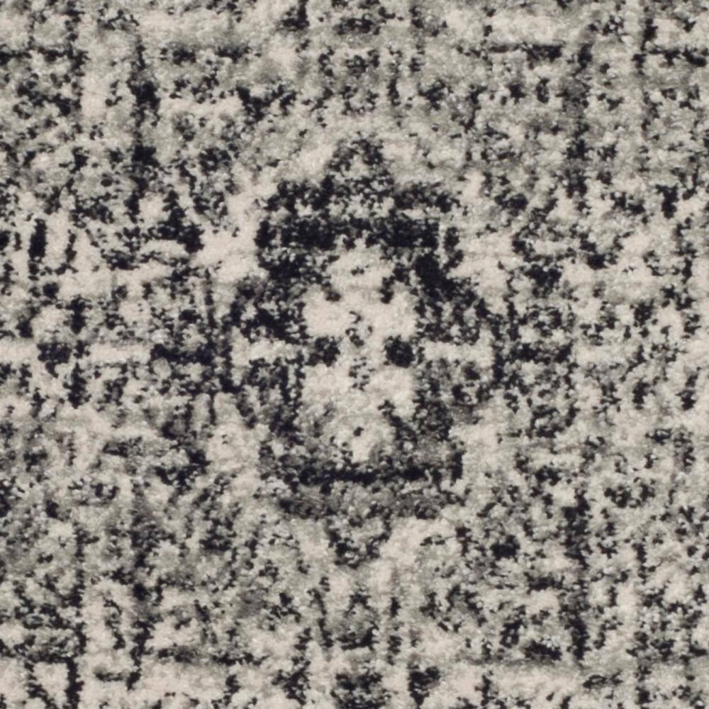 Ivory and Black High Pile Synthetic Area Rug