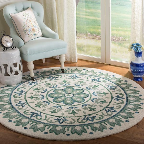 Novelty Ivory/Teal 5 ft. x 5 ft. Round Border Area Rug