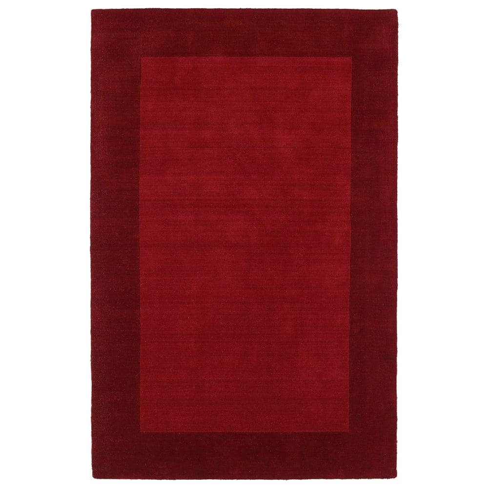 Kaleen Regency Red 5 ft. x 8 ft. Area Rug Transform your flooring with the Kaleen 5 ft. x 8 ft. Area Rug. This rug comes in a red shade, ideal for adding sophistication and warmth to your home. Made from 100% wool, it feels comfortable under your feet. It feature materials known to have low VOC emissions, ensuring that there is no need to aerate it before taking it indoors.