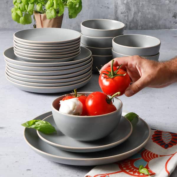 https://images.thdstatic.com/productImages/40f3352d-6306-46cc-b309-4257fe1faf93/svn/matte-gray-gibson-home-dinnerware-sets-131275-24-31_600.jpg
