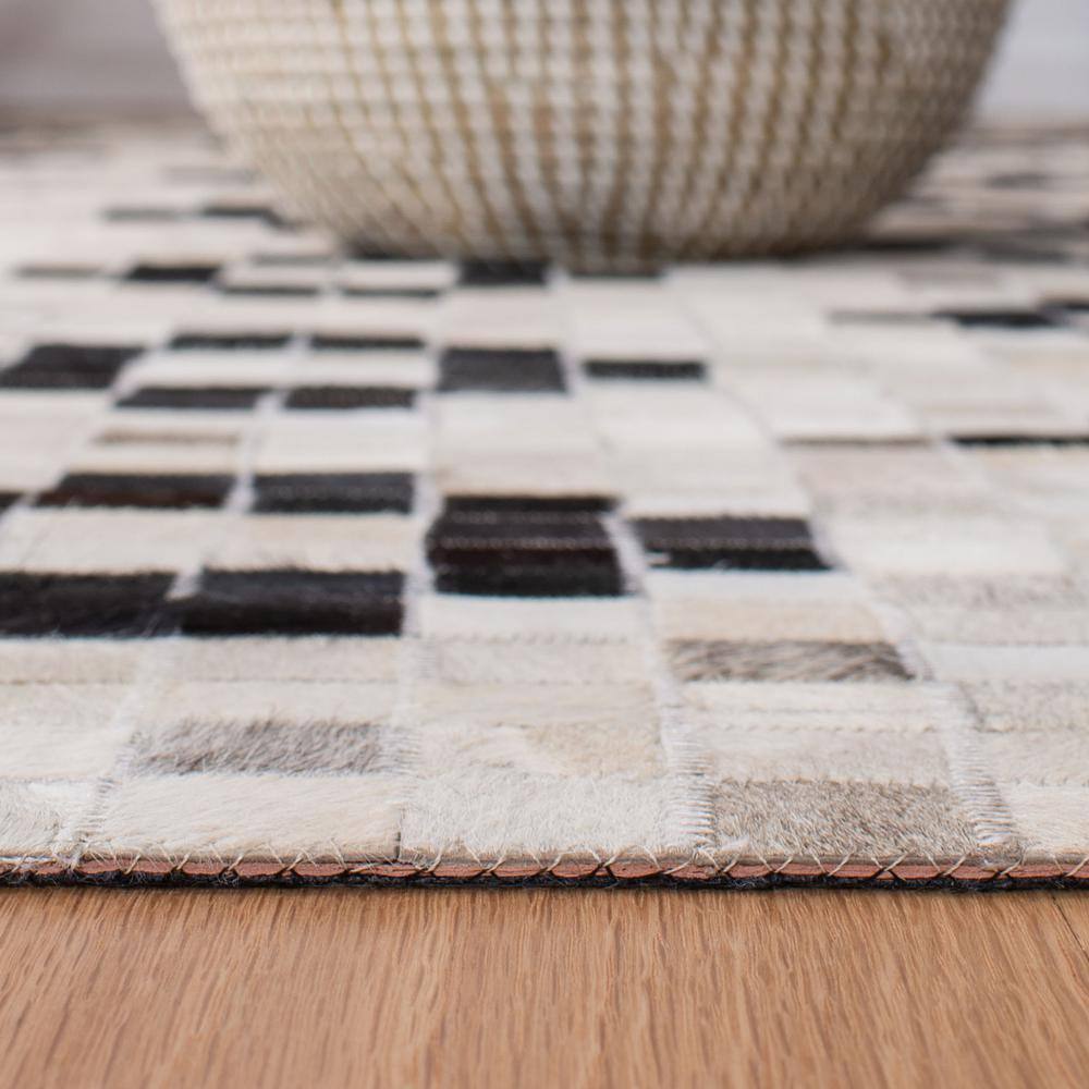 Handmade Black and White Geometric Cowhide Rug
