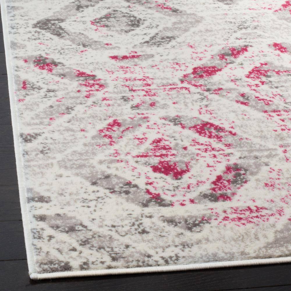 Ivory and Pink Medallion Synthetic 5' x 7' Area Rug
