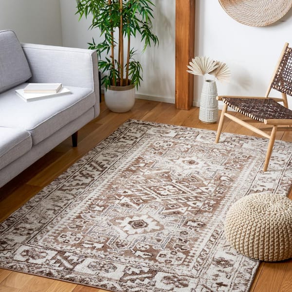 https://images.thdstatic.com/productImages/410f8a18-447b-40c2-9d02-0a91508c5e84/svn/brown-ivory-safavieh-area-rugs-vth211t-4-e1_600.jpg
