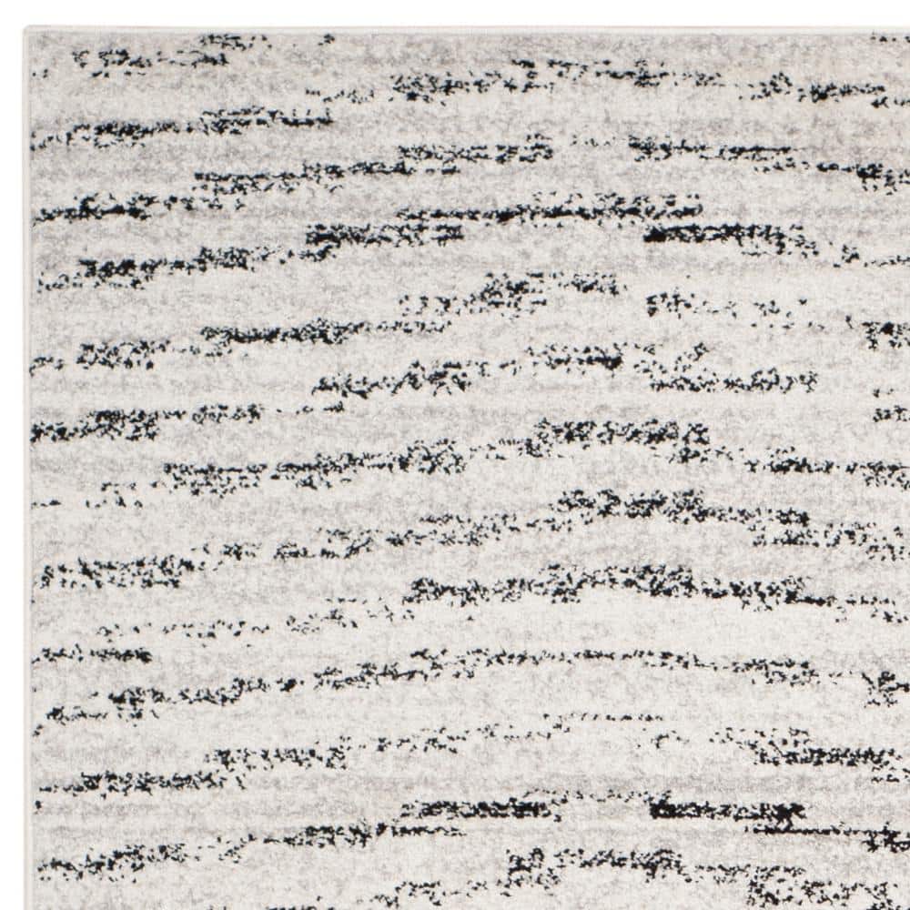Ivory and Silver 8' x 10' Reversible Rectangular Area Rug