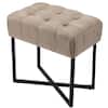 Beige linen ottoman footrest against a white background.