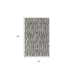 5 x 8 Black and Taupe Abstract Area Rug