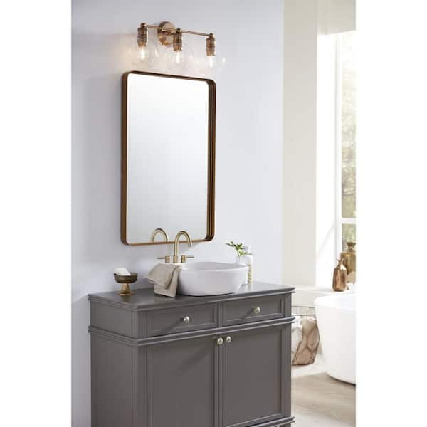 Progress Lighting Hansford Collection 24-1/2 in. 3-Light Gold Vintage Brass Clear Glass Coastal Farmhouse Bathroom Vanity Light