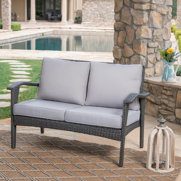Noble House Honolulu Grey Wicker Outdoor Loveseat with Silver Cushions