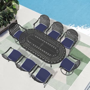 Vintage 9-Piece Cast Aluminum Outdoor Dining Set with Oval Table and Swivel Dining Chairs with Blue Cushion