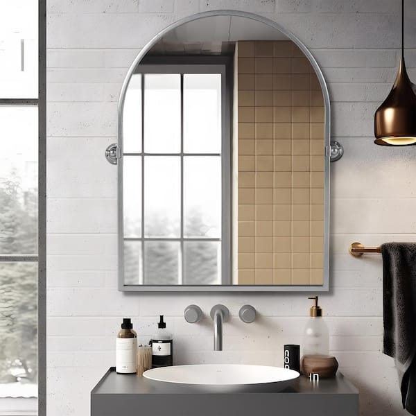 24 in. W x 36 in. H Arched Metal Framed Pivoted Wall Vanity Mirror