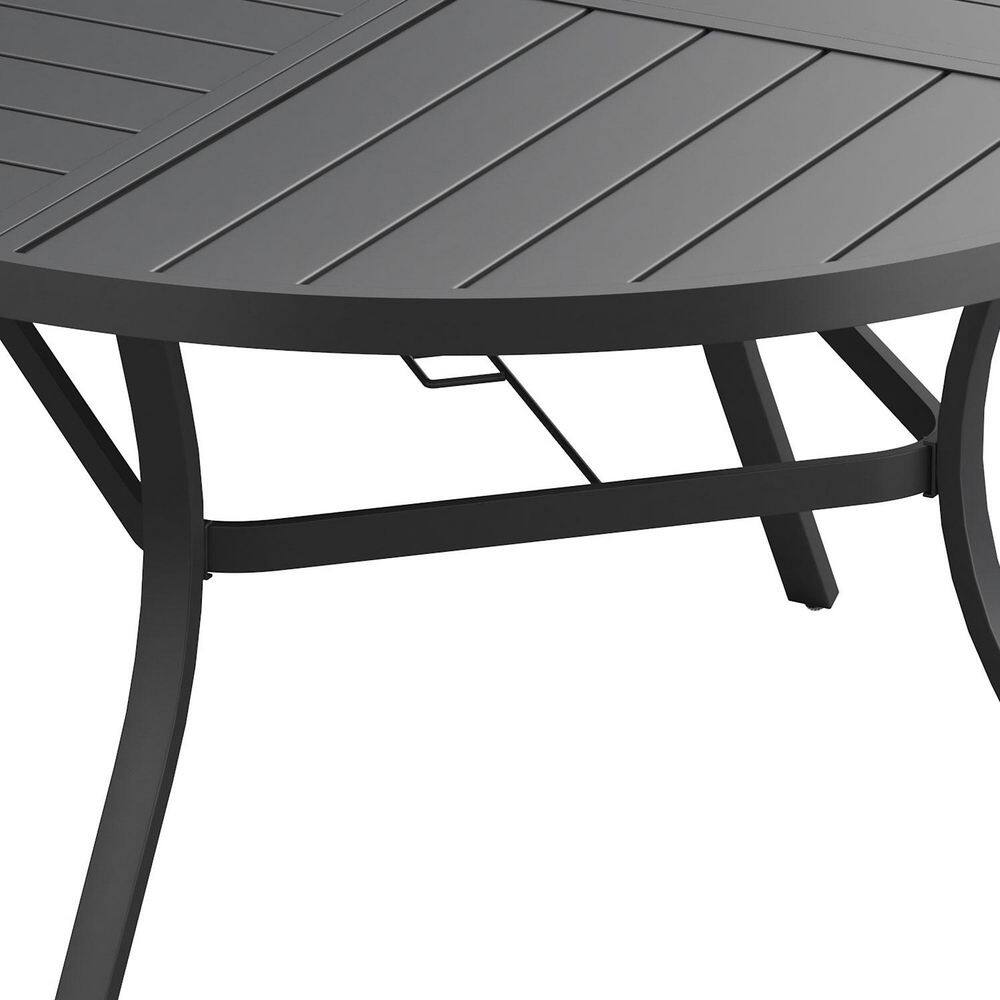 Detail of the black metal table legs and support brace.