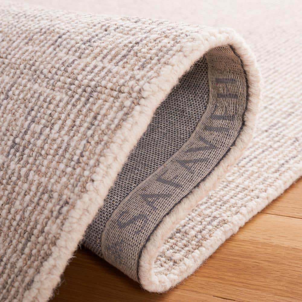 Ivory Abstract Hand-Tufted Wool 5' x 8' Area Rug