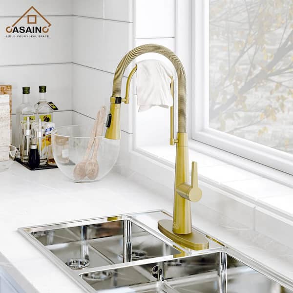 Single-Handle Spring Neck Standard Kitchen Faucet with Dual Function Sprayhead and Deckplate Included in Brushed Gold