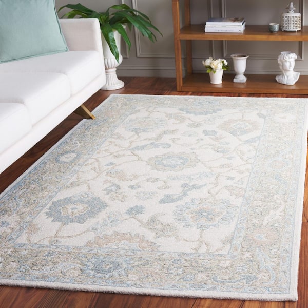 Ebony 2 ft. x 3 ft. Ivory/Blue Floral Border Area Rug