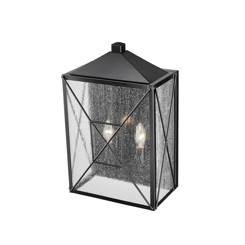 Caswell Black Metal Outdoor Wall Sconce with Clear Glass
