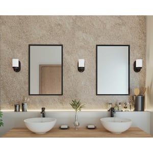 Glide Collection 1-Light Rubbed Bronze Etched Opal Glass Coastal Bath Vanity Light