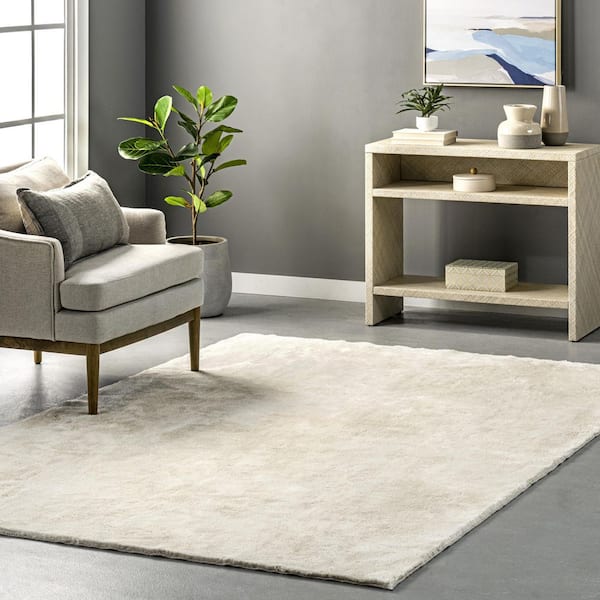 Loni Solid Machine Washable Shag Cream 6 ft. x 9 ft. Area Rug