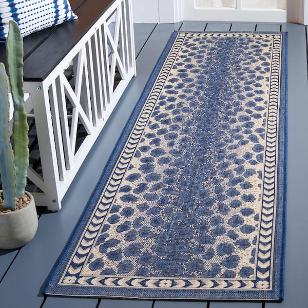 Courtyard Navy/Beige 2 ft. x 8 ft. Border Cheetah Indoor/Outdoor Runner Rug