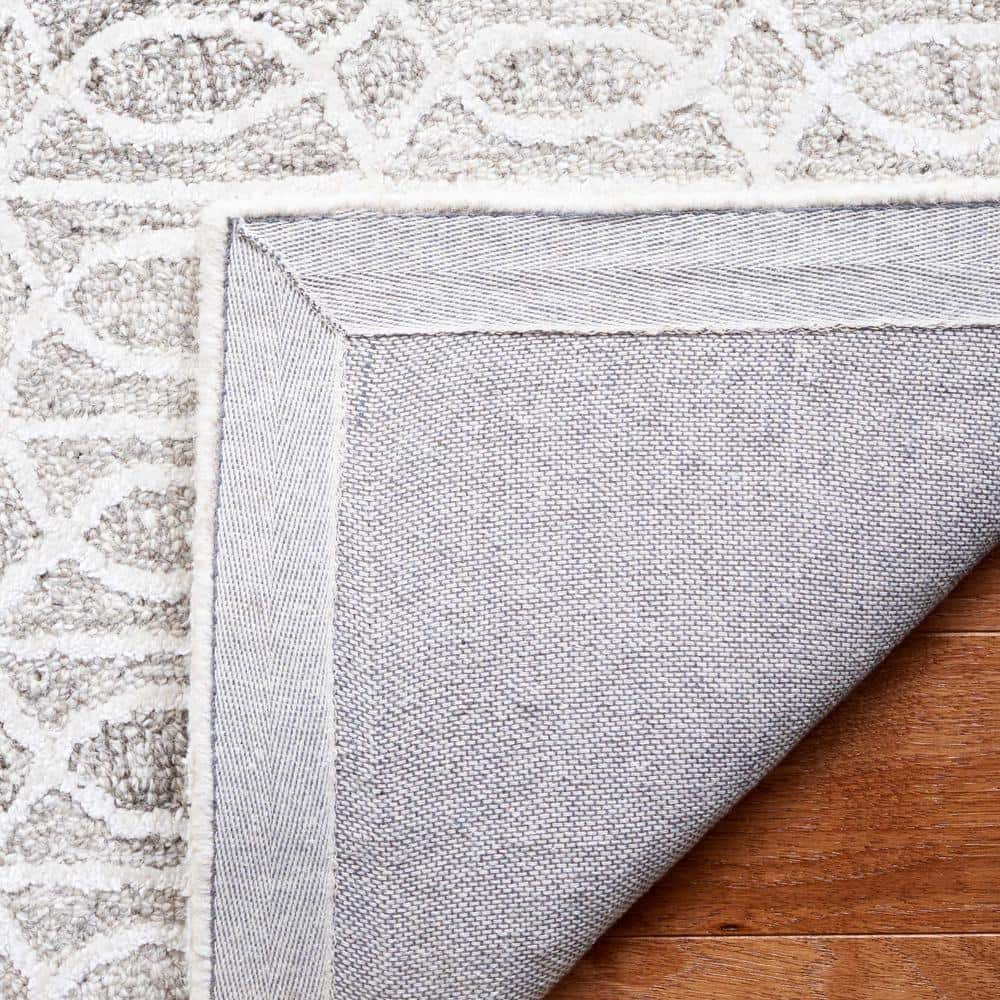 Natural Ivory Tufted Rectangular Wool Area Rug 6' x 9'
